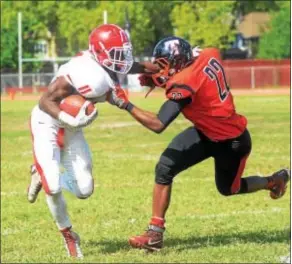  ?? GREGG SLABODA — TRENTONIAN FILE PHOTO ?? Rancocas Valley’s Iverson Clement, left, a University of Florida commit, ran past Hopewell Valley’s defense on Friday night.