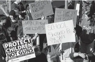  ?? David Zalubowski/associated Press ?? Students call for gun control measures during a rally outside the Capitol in Denver on Thursday, the day after a shooting left two administra­tors injured at East High School.