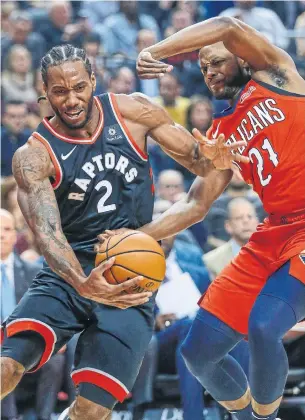  ?? RICK MADONIK TORONTO STAR ?? Raptors forward Kawhi Leonard gets past Pelicans forward Darius Miller on Monday night at Scotiabank Arena. Even on days when the Raptors have rested Leonard, they have been a force.