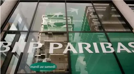  ?? AFP/VNA Photo ?? This file photo shows the outside of a BNP Paribas in Paris.