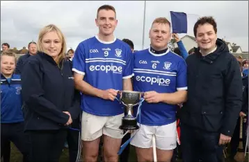  ??  ?? Ballyhogue joint captains Graham Parker and Seán Rochford with Sabrina Furlong of Permanent TSB (sponsors) and Cathal Byrne (County Board Developmen­t Officer and Ballyhogue club Secretary).