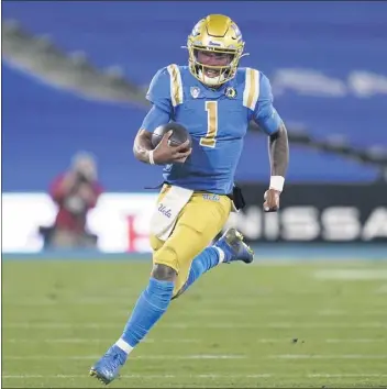  ?? ASHLEY LANDIS — THE ASSOCIATED PRESS ?? UCLA quarterbac­k Dorian Thompson-Robinson is expecting big things from the Bruins’ offense again this season.