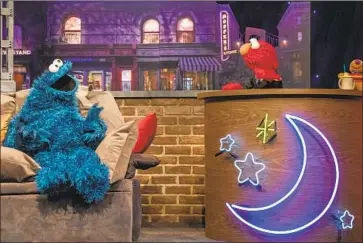  ?? Richard Termine ?? THE MUPPET gabfest “The Not-Too-Late-Show With Elmo,” with cohost Cookie Monster at left, is a fave.