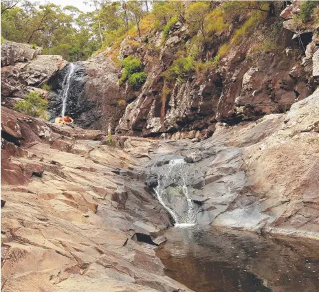  ??  ?? Below Cedar Creek Falls are a series of plunge pools, perfect for a cooling dip.