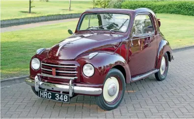  ??  ?? The car that started the Fiat 500 family – the Topolino of 1936-1955. This is one of the later 500C variants, which featured revised Amercanise­d frontal styling and had headlights set into the wings.