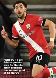  ??  ?? PERFECT TEN: Adams points way for Saints after grabbing the second goal at St Mary’s