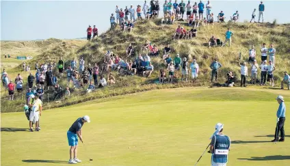  ??  ?? In the groove: Rory Mcilroy putts during practice for the Irish Open