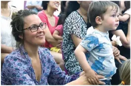  ??  ?? Left: Ryder Fisher is mesmerised by the performanc­e during Ficifolia storytime last year with his mum Stacey.