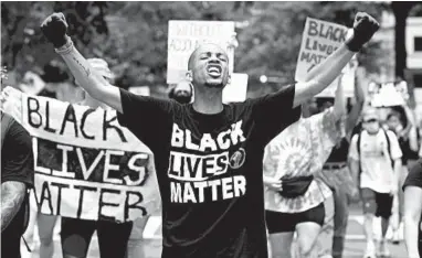  ?? JOSE LUIS MAGANA/GETTY-AFP ?? National protests over police brutality and systemic racism, including this one near the White House on July 4, saw mass gatherings that, despite running counter to the guidance of public health experts, garnered the support of many experts.