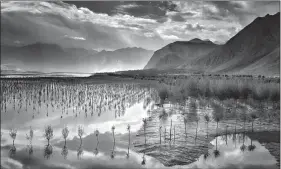  ??  ?? Dawn over Skardu, Pakistan I, by William Dalrymple.