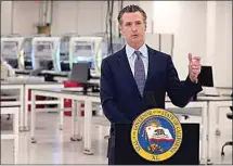  ?? MARCIO JOSE SANCHEZ / AP ?? In this Oct. 30 file photo, California Gov. Gavin Newsom speaks at a COVID-19 testing facility in Valencia.