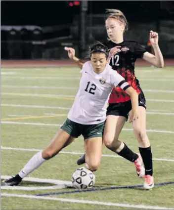  ?? Courtesy photo ?? Canyon’s Claudia McKail (left) led the Cowboys with 13 goals in the regular season.