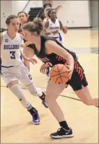  ?? Scott Herpst ?? Lafayette’s Michaela Baker tries to drive past Trion’s Summer Vaughn during Saturday’s game. Baker and the Lady Ramblers held on for a 58-57 victory.