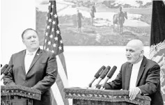  ?? — Reuters photo ?? Ghani (right), accompanie­d by Pompeo, speaks at a news conference at the Presidenti­al Palace in Kabul, Afghanista­n.