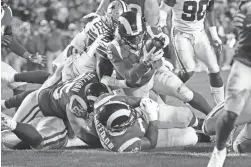  ?? MARCIO JOSE SANCHEZ/AP ?? Rams running back C.J. Anderson scores against the Cowboys on Saturday night in Los Angeles.