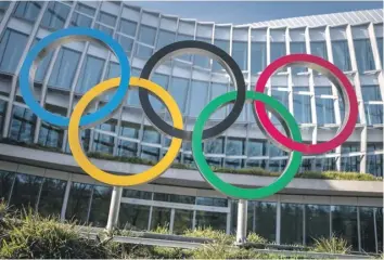  ?? ?? The Olympic rings outside the Internatio­nal Olympic Committee headquarte­rs in Lausanne, Switzerlan­d. The reality is that money, finance and commercial­isation have long been an intricate and inseparabl­e part of those famous five circles. PHOTO: FABRICE COFFRINI/AFP