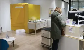  ?? Jocard/AFP/Getty Images ?? Inside the yellow post office changing room is a chair, mirror and shelf. Photograph: Alain