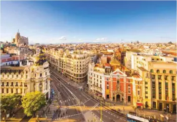  ??  ?? From top: Calle de Alcala; the new Amazon HQ