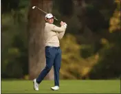  ?? RYAN KANG —THE ASSOCIATED PRESS ?? Patrick Cantlay hits from the fairway on the 13th hole during the third round of the Genesis Invitation­al golf tournament at Riviera Country Club on Saturday in the Pacific Palisades area of Los Angeles.