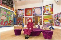  ?? CONTRIBUTE­D BY TOMOAKI MAKINO ?? Yayoi Kusama, who is 89, has been producing art for more than 60 years. Here she is seen in a 2016 photo with recent works.