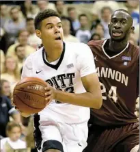  ?? Matt Freed/Post-Gazette ?? Pitt's Cam Johnson is among a growing group of players who played their high school basketball locally and are now making an impact on the area’s Division I teams.