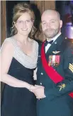  ??  ?? COZY COUPLE: Elegant Leigh Ann Killin and decorated officer Jonathan Tremblay enjoy festivitie­s at the annual St. Pat’s Charity Ball.