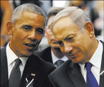  ?? RONEN ZVULUN/ASSOCIATED PRESS FILE ?? President Barack Obama speaks to Israeli Prime Minister Benjamin Netanyahu during the burial ceremony Sept. 30 of former Israeli President Shimon Peres at Mount Herzl Cemetery in Jerusalem. Obama may have to decide whether the U.S. will exercise its...