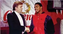  ?? DAVE PICKOFF / ASSOCIATED PRESS 1984 ?? Then-New Jersey Generals owner Donald Trump shakes hands with Herschel Walker at a press conference in New York on March 8, 1984, after agreeing on a 4-year contract.