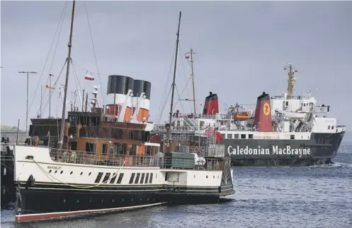  ??  ?? 0 A Calmac ferry brought stranded passengers back to the mainland after the collision in Brodick on Thursday evening