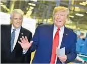  ?? MANDEL NGAN/GETTY-AFP ?? President Trump focuses on the inquiry during a tour of an Apple assembly plant with Rep. John Carter, R-Texas.