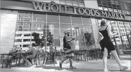  ?? Mel Melcon Los Angeles Times ?? THE GROCERY INDUSTRY was jolted June 16 when Amazon announced a deal for Whole Foods, a 465-store chain that focuses on natural and organic foods.