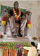  ?? — PTI ?? BSP supremo Mayawati pays tribute to Dr B.R. Ambedkar in Lucknow on Friday.