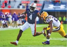  ?? AUBURN PHOTO BY SHANNA LOCKWOOD ?? Auburn freshman running back Tank Bigsby helped the Tigers to a 48-11 dismantlin­g of LSU on Halloween.