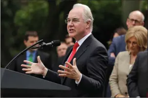  ?? The Associated Press ?? HEALTH CARE: Health and Human Services Secretary Tom Price speaks Thursday in the Rose Garden of the White House in Washington, after the House pushed through a health care bill. Cutting nearly $1 trillion from Medicaid will give states the freedom to...