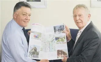  ??  ?? Sunderland City Council cabinet secretary Coun Mel Speding (left) and leader Coun Harry Trueman examine the 3, 6, 9 document.