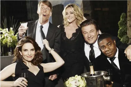  ??  ?? TOGETHER AGAIN: The cast of ‘30 Rock’ — Tina Fey, Jack McBrayer, Jane Krakowski, Alec Baldwin and Tracy Morgan, from left — will have a virtual reunion to roll out NBC’s 2020-21 lineup.