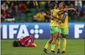  ?? GARY DAY — THE ASSOCIATED PRESS ?? Defender Allyson Swaby, right, and Tiernny Wiltshire celebrate Jamaica's first win at the Women's World Cup.