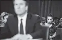  ?? PHOTO BY SAUL LOEB/POOL PHOTO VIA AP ?? Actress and activist Alyssa Milano listens as Supreme Court nominee Brett Kavanaugh testifies before the Senate Judiciary Committee on Capitol Hill in Washington in September.