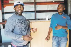  ?? Picture: Phumlani Thabethe ?? ‘ENDLESS CHALLENGES’. Bavunge Michel, left, from Burundi, and Lucien Musasa from the DRC speak about the difficulti­es of trying to restart their businesses after the recent attacks.