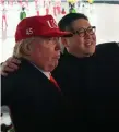  ??  ?? People dressed as Kim Jongun and Donald Trump at the Olympics opening ceremony
