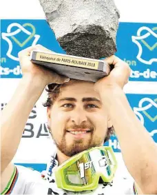  ?? Peter Sagan poprvé ovládl Paris–Roubaix FOTO ČTK/ AP ?? Trojnásobn­ý mistr světa