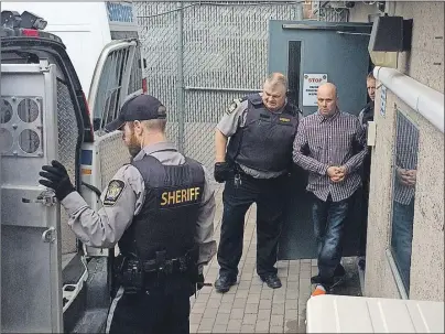  ?? CAPE BRETON POST PHOTO ?? Richard McNeil, 40, of Gardiner Mines, was taken Friday from the Sydney Justice Centre to a hospital in Dartmouth for a psychiatri­c assessment. He is charged with first-degree murder in connection with the death of his common-law partner Sarabeth Ann...