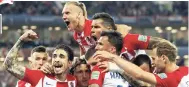  ??  ?? Croatia’s players celebrate after beating Nigeria.