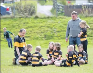  ?? Photos: Abrightsid­e Photograph­y ?? Lochaber youngsters hold a pre-match huddle.