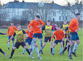  ??  ?? U/19 Peter McAvoy Cup action from Graham Street where Fairmuir Violet beat Forfar West End (yellow) 6-3.