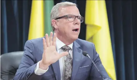  ?? TROY FLEECE ?? That sound you heard Monday was outgoing Saskatchew­an Premier Brad Wall shooting himself in the foot, says columnist Graham Thomson of the end of the interprovi­ncial licence plate dispute.