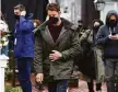  ?? Arnold Gold / Hearst Connecticu­t Media ?? Actor Justin Hartley, center, walks to the Griswold Inn Store for the filming of a scene for the movie, The Noel Diary, in Essex on May 29, 2021.