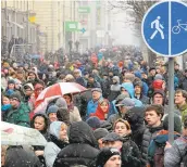  ?? SERGEI GAPON/AGENCE FRANCE-PRESSE VIA GETTY IMAGES ?? Protesters against President Alexander Lukashenko’s rule and new tax on “spongers” — those who work less than six months a year — gather in central Minsk on Saturday.