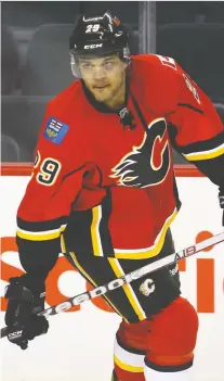  ?? DARREN MAKOWICHUK FILES ?? Akim Aliu, seen here in action with the Calgary Flames in 2012, says the NHL needs to talk about how racism, misogyny, bullying and homophobia permeate the culture of hockey.