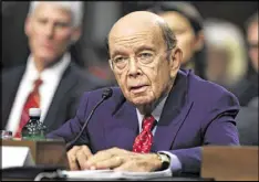  ?? MANUEL BALCE CENETA / AP ?? Wilbur Ross testifies on Capitol Hill in Washington, at his four-hour confirmati­on hearing before the Senate Commerce Committee. Ross was confirmed Monday as commerce secretary in President Donald Trump’s administra­tion.